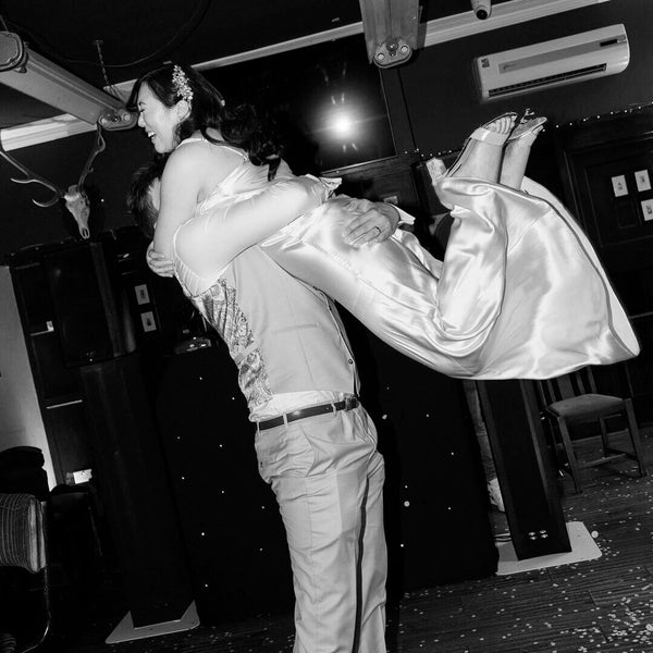 Christina wore the Lourdes crystal floral drop earrings by Aria and the Silver crystal encrusted sparkling comb by Ivory & Co. Photography by Heather Sham.