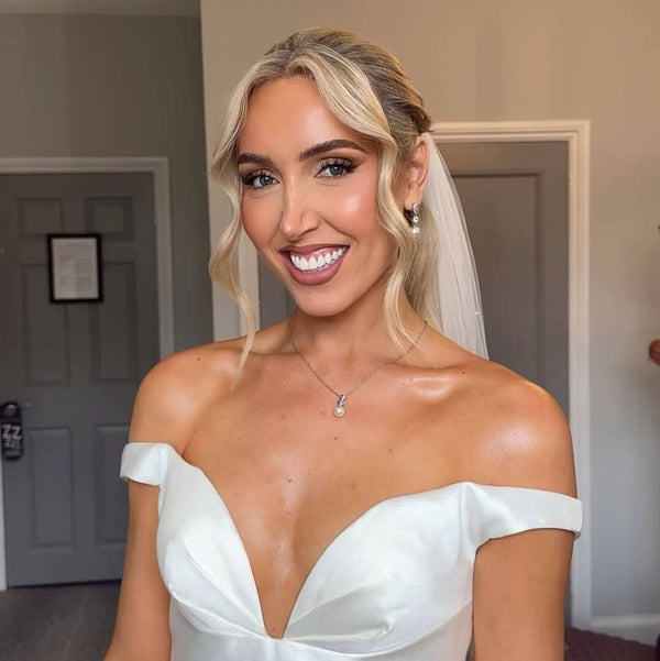 Jordan wore the Avery crystal and pearl drop earrings & Avery pave crystal pearl pendant necklace by Aria. Photography by Chloe Martin.