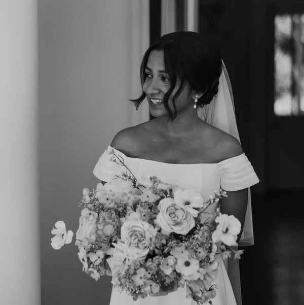 Krittika wore&nbsp;the&nbsp;Triple freshwater pearl short drop earrings by Chez Bec and the Payton crystal baguette loop drop earrings by Aria. Photography by Anita Masih.