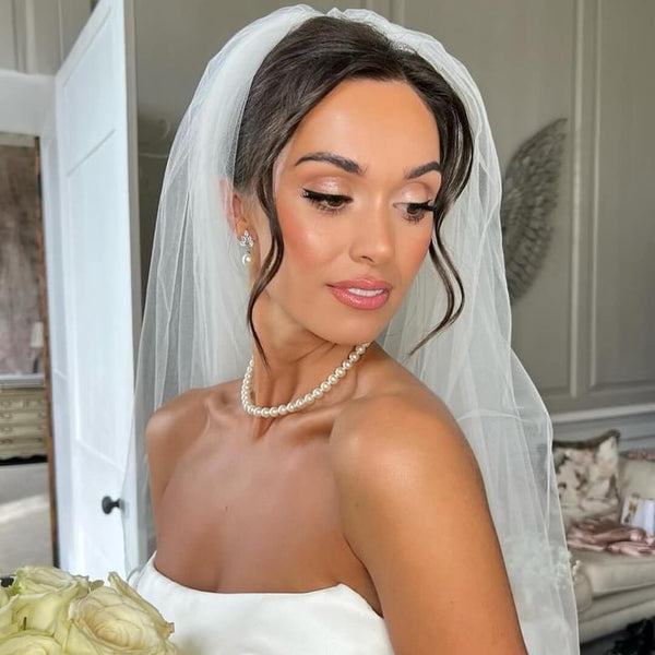Lucy wore the Queenie pearl drop earrings (silver) by Stephanie Browne. Photography by Megan Layland Makeup.