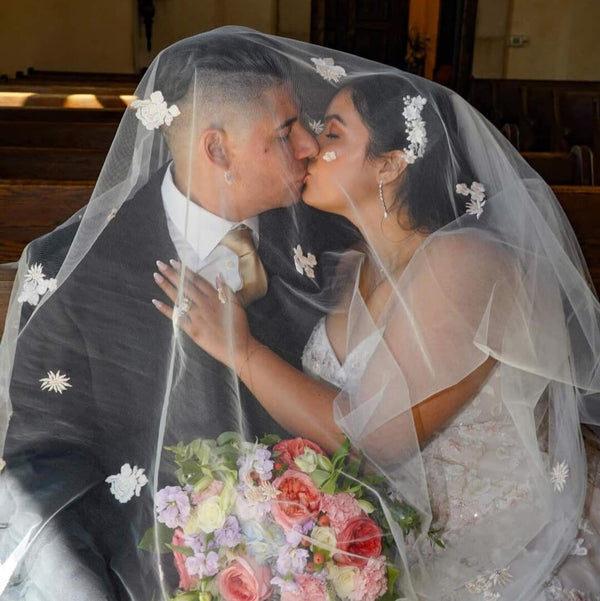 Marissa wore the Melbourne crystal long pearl drop earrings by Ivory &amp; Co and the Serenata fabric floral pearl hair comb by Aria. Photography by EleveightMedia.