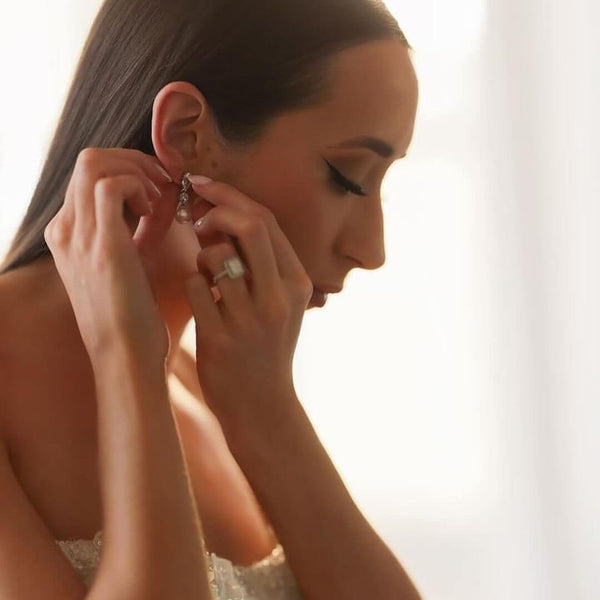 Nicolle wore the Avery crystal and pearl drop earrings by Aria. Photography by Galya Rudenko.