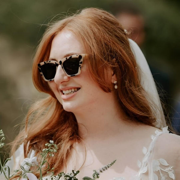 Lydia wore the Romy navette pearl drop earrings by Aria. Photography by Siobhan Beales photography.