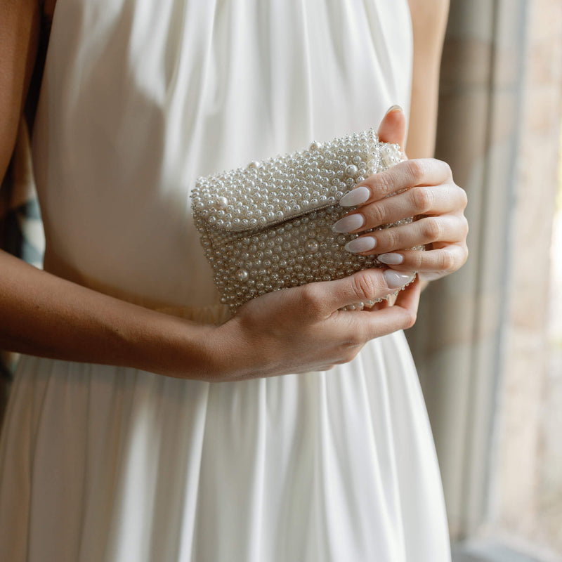 All over pearl beaded mini bag