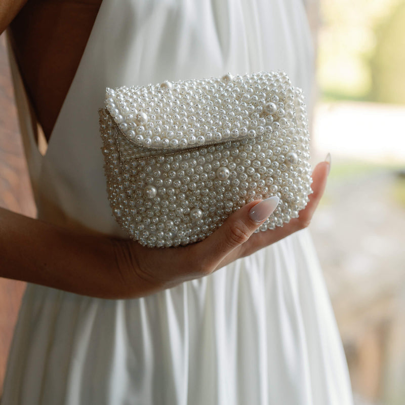 All over pearl beaded mini bag