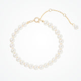 Romy pearl drop earrings and Alta pearl jewellery set (gold)