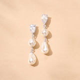 Avrie long drop baroque pearl earrings (silver)