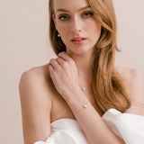 Infinite minimal pear zirconia necklace and bracelet set (gold) - Liberty in Love