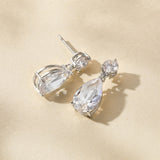 Luce pear-cut crystal drop earrings (silver)