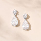 Luce pear-cut crystal drop earrings (silver)