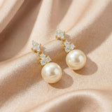 Riva pearl drop earrings (gold) - Liberty in Love