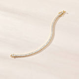 Riviere classic round-cut crystal tennis bracelet (gold)