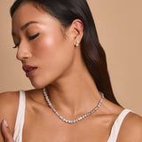 Riviere petal halo drop earrings