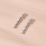Riviere ray crystal linear drop earrings