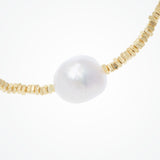 Single freshwater baroque pearl gold bracelet
