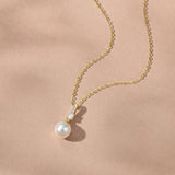 Sorella loop pearl earrings and pendant set (gold)