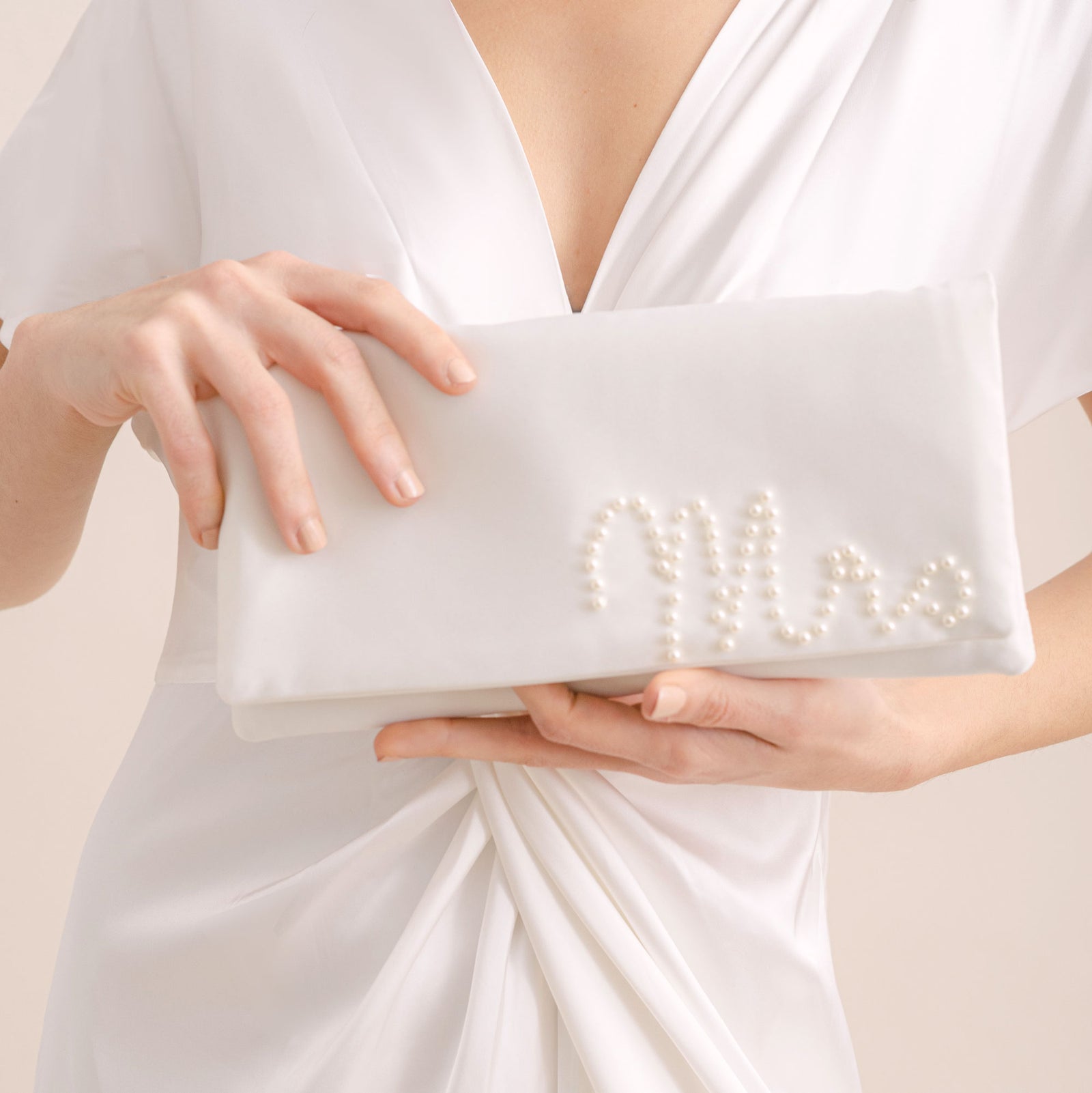 Mrs' pearl embellished ivory satin clutch Emma Gordon London