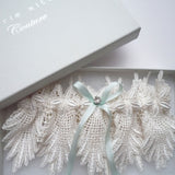 Eden ivory lace garter with rhinestone trim and duck egg blue bow - Liberty in Love